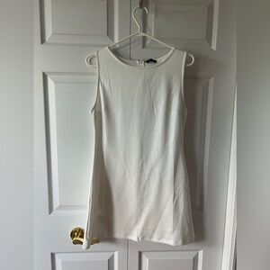 White fox brand new dress. Size large never worn perfect condition.